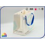 White Coated Paper Shopping Bags Custom Size Matte Lamination With Blue Handle for sale