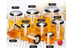 China 730ml Polygon Hexagon Glass Storage Bottles Embossed For Chili Sauce Pickle supplier