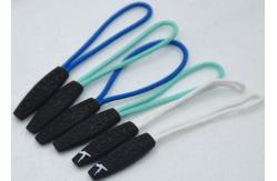 China Novelty SGS 3D Embossed Plastic Zipper Puller With Polyester String supplier