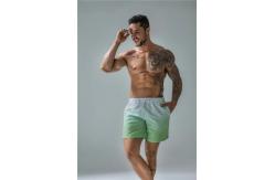 China Gradient Beach Wear Shorts Men Casual Five Point Mens Designer Swim Trunks supplier