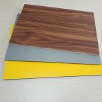 Circular Cladding Wood Grain Aluminum Composite Panel Embossed Surface Density 2.5% for sale