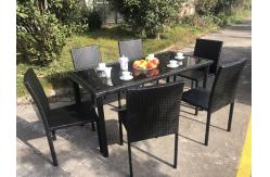 China Stackable Chair Outdoor Rattan Dining Set KD Tabke With Black Glass supplier