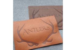 China Customized Hot Stamped Antique Copper Embossed Leather Patches supplier