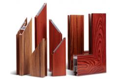 China Extruded Wood Grain 6063 T5 Aluminium Alloy Window Door Extrusion Aluminum supplier