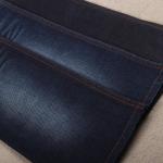 Egyptian Cotton Spandex Slub Indigo Embossing Denim Jeans Fabric Factory for sale