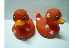 China Phthalate Free Letter Printed Weighted Rubber Ducks Toy With Camouflage Design supplier