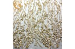 China Gold 140cm Width Machine Embroidery Lace Customized Lace Fabric For Dresses supplier