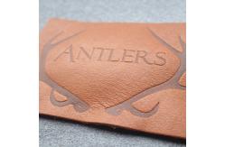 China Customized Hot Stamped Antique Copper Embossed Leather Patches supplier