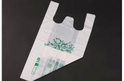 China Compostable Cornstarch Single Layer Laminated Biodegradable T Shirt Bags supplier