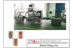 China Granule Weighing Candy Filling Machine Line With Induction Cap Sealing Machine  supplier