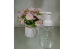 China Foam Pump Bottle With Transparent Housing Clip Lock Adjustable Output supplier