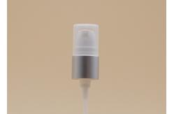 China 18mm Cosmetic Treatment Pumps Matt Silver Closure White PP Half Cap supplier