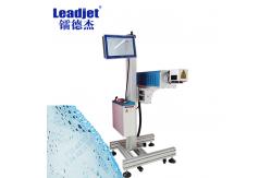 China 40W Films Materials CO2 Laser Expiry Date Coder With High Printing Speed supplier