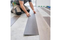 China SPC Rigid Core Vinyl Plank Flooring with Class 33/42 Rating, 0.3-0.7mm Wear Layer, and Bfl-s1 Fire Classification supplier