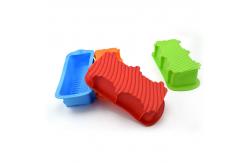 China 164g Heat Resistant Silicone Cake Molds Bread Baking Trays supplier