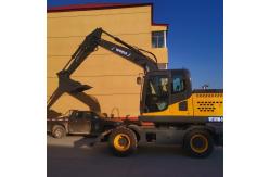 China Small Bucket Wheeled Mini Excavator Hydraulic Control Earth Moving Machine supplier