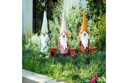 China Metal Garden Ornaments Spring Brights Gnome Garden Statuary With Planter supplier