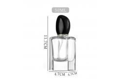 China Square Glass Perfume Bottle with 50ml 100ml Capacity and Distinctive Irregular-shaped Cap supplier