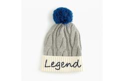 China Cable Knitted Pom Pom Hat With Embroidery Easy To Pair With Winter Clothes supplier