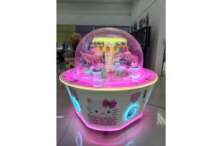 China Newly designed multiplayer gift  candy prize out machine  coin operated game machine supplier