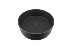China Black Round Concrete Wash Basin With No Faucet Holes And Pop Up Drain supplier