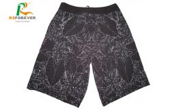 China Sublimated Black Beach Men Board Shorts With Side Pocket  Leaf Pattern supplier