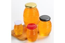China Bee Shape Little Glass Jars , Fancy Threaded Round Glass Jar With Lid supplier