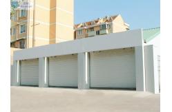 China Commercial Security Electrical Remote Control Vertical Roller Shutter Doors supplier
