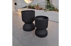 China Round Minimal Texture Fibre Clay Plant Pot Lightweight In Black supplier