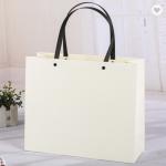 Pantone Colored Kraft Paper Bag Packaging With Synthetic Handles for sale