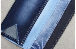 China 8.3 Oz Indigo Blue Jeans Denim Fabric Cotton Poly Spandex Power Stretch supplier