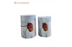 China Cylinder Paper Packaging Tubes Cardboard Custom Round Gift Boxes With Handle Rope supplier