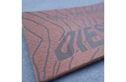 China Brown Rectangle Shape 3D Custom Embossed Labels supplier