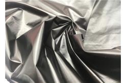China 100% Nylon Shiny Fabric Material Polyamide Lightweight Cire Fake PU Waterproof Down Jacket Fabric supplier