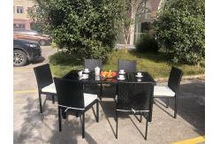China Stackable Chair Outdoor Rattan Dining Set KD Tabke With Black Glass supplier