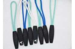 China Novelty SGS 3D Embossed Plastic Zipper Puller With Polyester String supplier