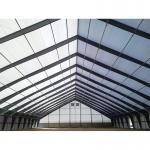 Heavy Duty Steel Warehouse Building Construction With C.Z Shape Purlin / Sliding Door for sale