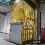 Customized Yellow Rolling Door Platform Warehouse Cargo Elevator Steel Heavy Loads Hydraulic Lifts for sale