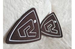 China Customized Brown Suede Embossed Leather Patches , Shiny Siliver High Density Tpu Logo supplier