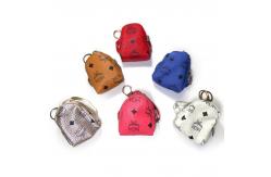 China OEM 58g Smooth Surface Personalised Leather Key Chain Backpack Accessories supplier