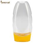 Food Grade Plastic Factory Price Special Plastic Honey Jar And Spoon 335ml Empty for sale
