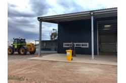 China 100% Recycled Steel Structure Building Warehouse With Flexible Layout supplier