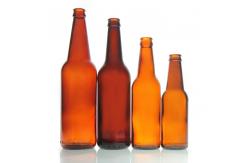 China Carbonated Bulk Glass Beer Bottles 330ml 12 Oz Transparent Clear supplier