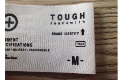 China Cotton Woven Clothing Labels With White Background And Printing Graphic Logo supplier