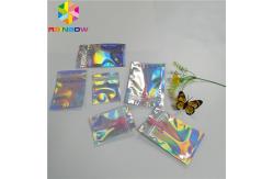 China Transparent Front Foil Packaging Bags Holographic Smell Proof Heat Seal Recyclable supplier