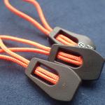 Durable Embossed Logo PVC Zipper Slider Puller for sale