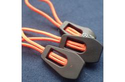 China Durable Embossed Logo PVC Zipper Slider Puller supplier