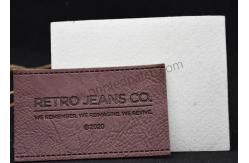 China Debossed PU PVC Custom Leather Labels For Handmade Items supplier
