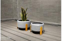 China Hand Carve Fiberclay Planter In Modern Hand Carved Design For Plants supplier