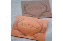 China Customized Hot Stamped Antique Copper Embossed Leather Patches supplier